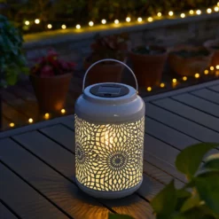 Glitzhome 8.75"H White Metal Cutout Solar Powered Lantern -Ceiling Lighting Shop 451157e002246258 3457 w800 h800 b0 p0