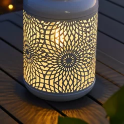 Glitzhome 8.75"H White Metal Cutout Solar Powered Lantern -Ceiling Lighting Shop b54118ea02246252 3457 w800 h800 b0 p0